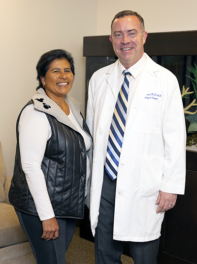 Deep Brain Stimulation patient, Rosa Bautista with Dr. Devin K. Binder following her DBS procedure.