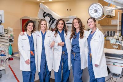 Female surgeons in OR.