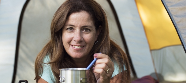 Image of a woman camping